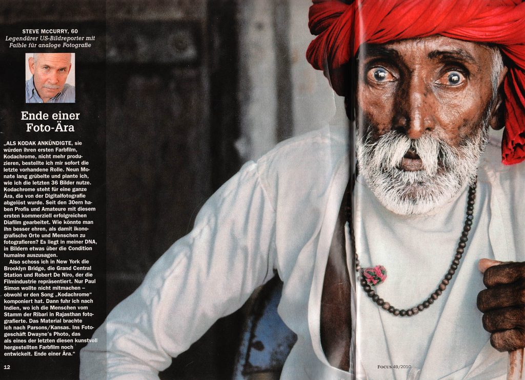 Im Magazin Focus erschien im Dezember 2009 die Geschichte über das Ende einer Ära: Fotografien von Steve McCurry, die er analog – mit einem der letzten verfügbaren Kodachrome-Filme – angefertigt hatte. Illustriert wurde die Story mit einem Porträt, das Holger Rüdel beim Schleswig-Besuch von McCurry 2009 aufnehmen konnte.